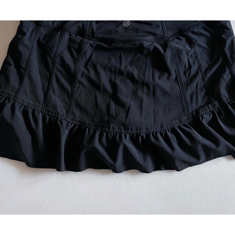 Cute tennis skirt by Athleta. Very comfortable- no obvious wear